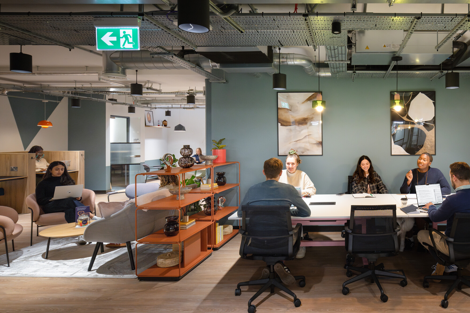 Work.Life Courtyard Building open-plan workspace with people utilising the space in a large meeting.