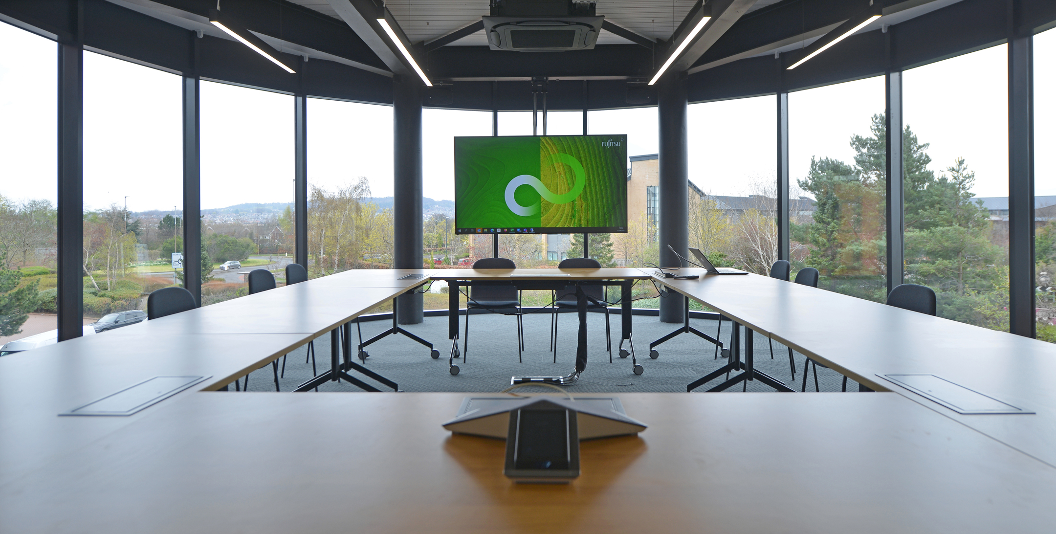 Meeting room furniture installed for Fujitsu Edinburgh, with integrated tech and panoramic views
