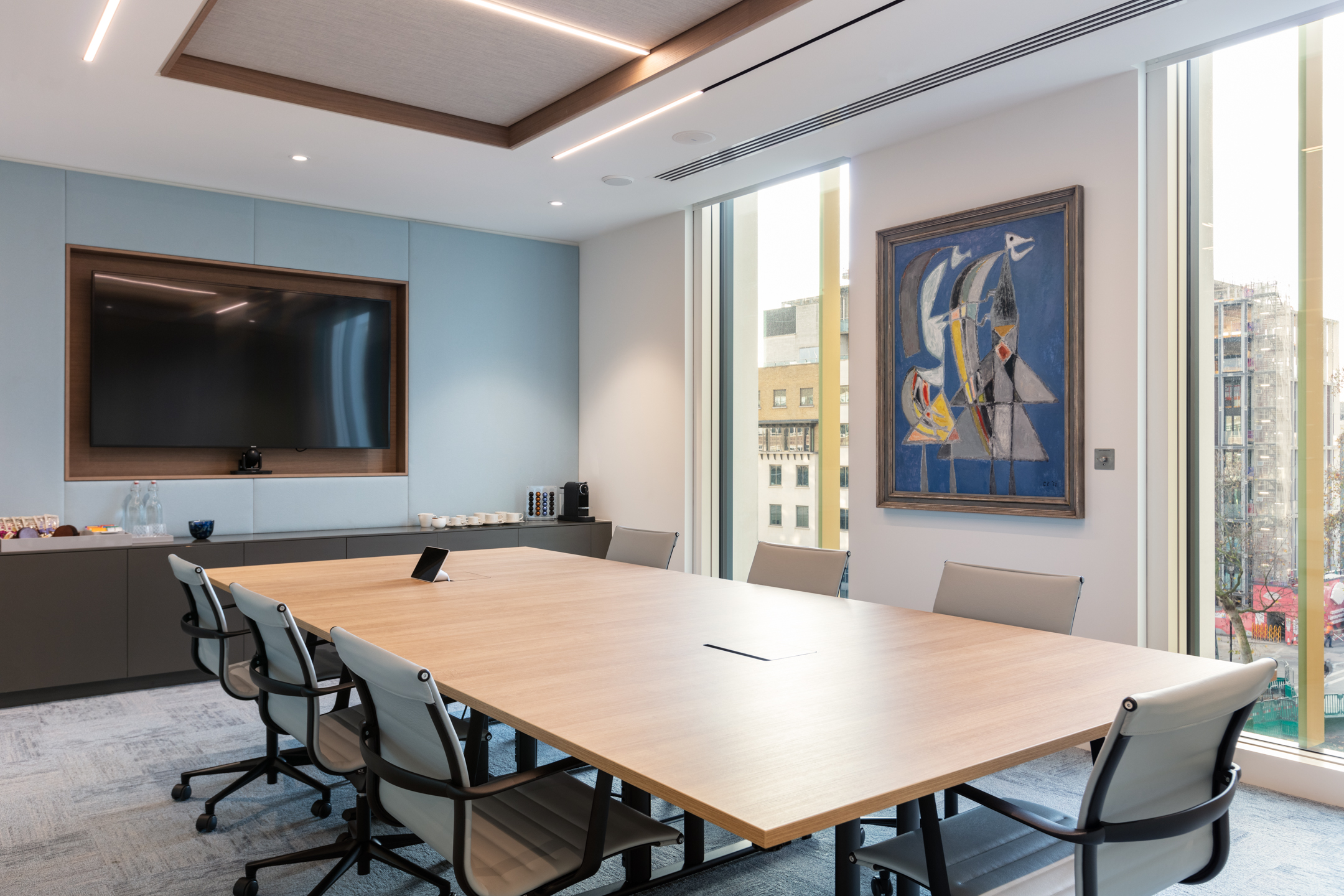 Boardroom for an Asset Management Firm featuring a timber meeting table city views and contemporary furniture selected by Platfform.