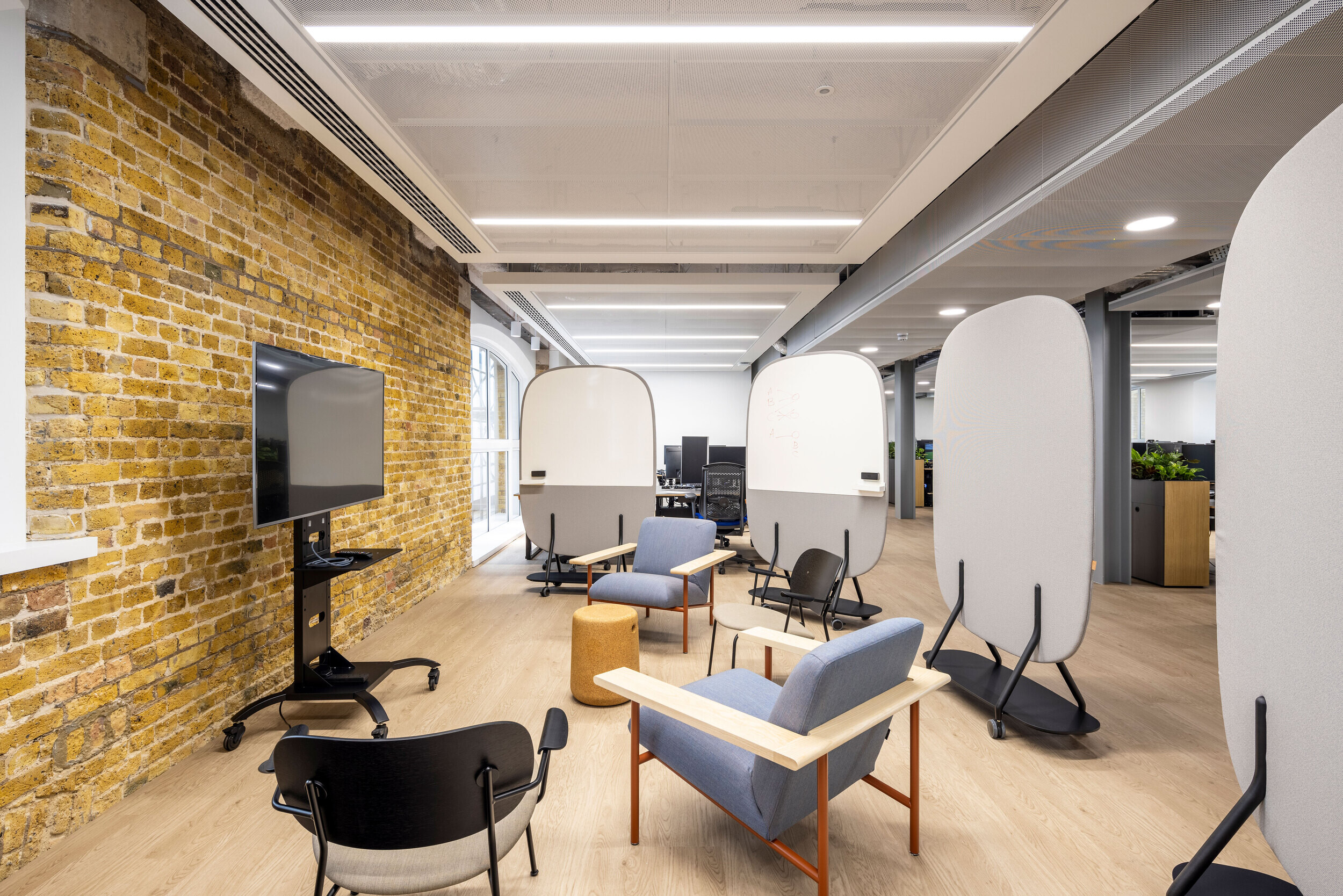 Dynamic team collaboration zone at CCP Games, offering flexible spaces for meetings and brainstorming sessions.
