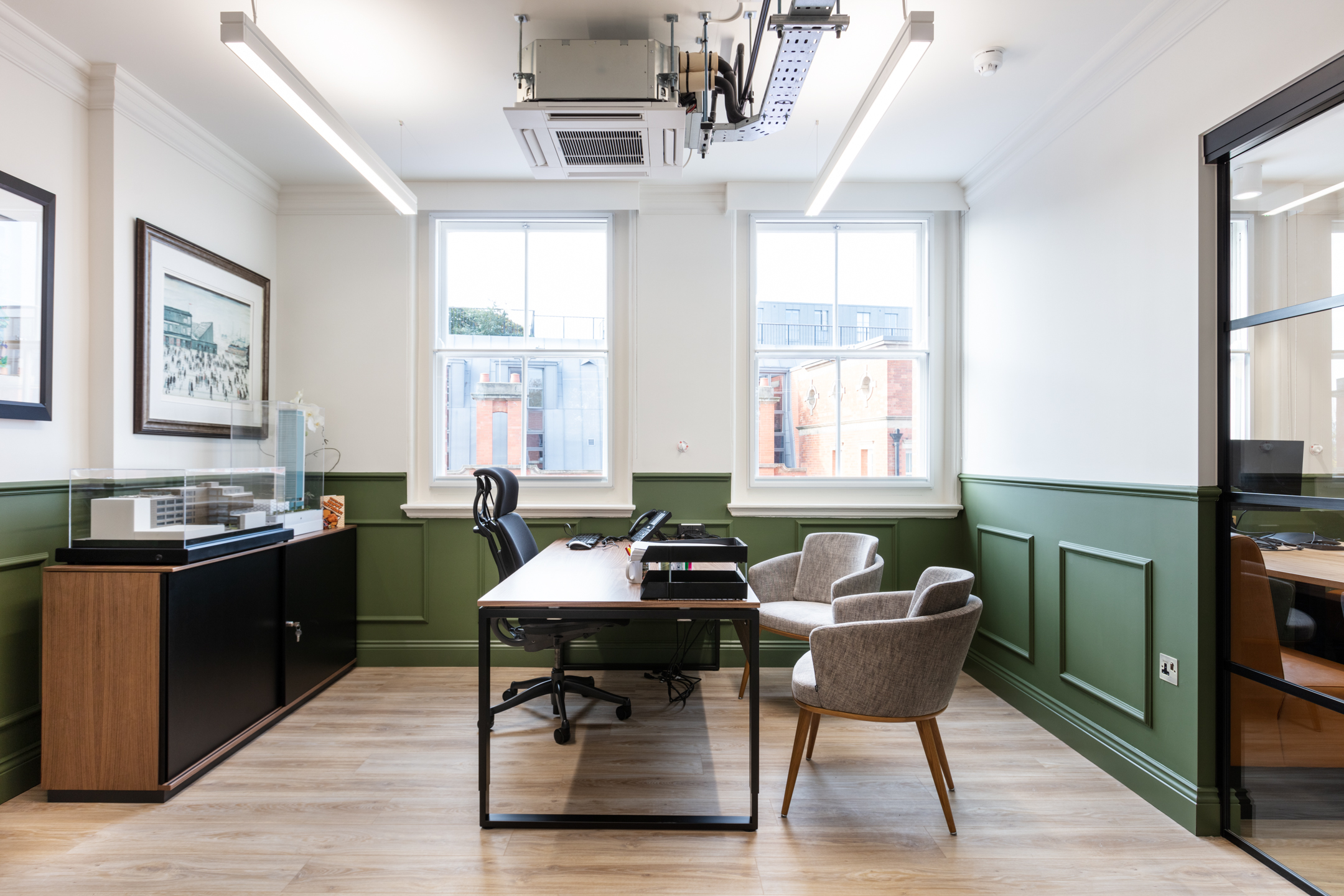 Private office at Cain International fitted with executive and guest seating, with all furniture specified by Platfform to suit the classic-meets-contemporary interior.