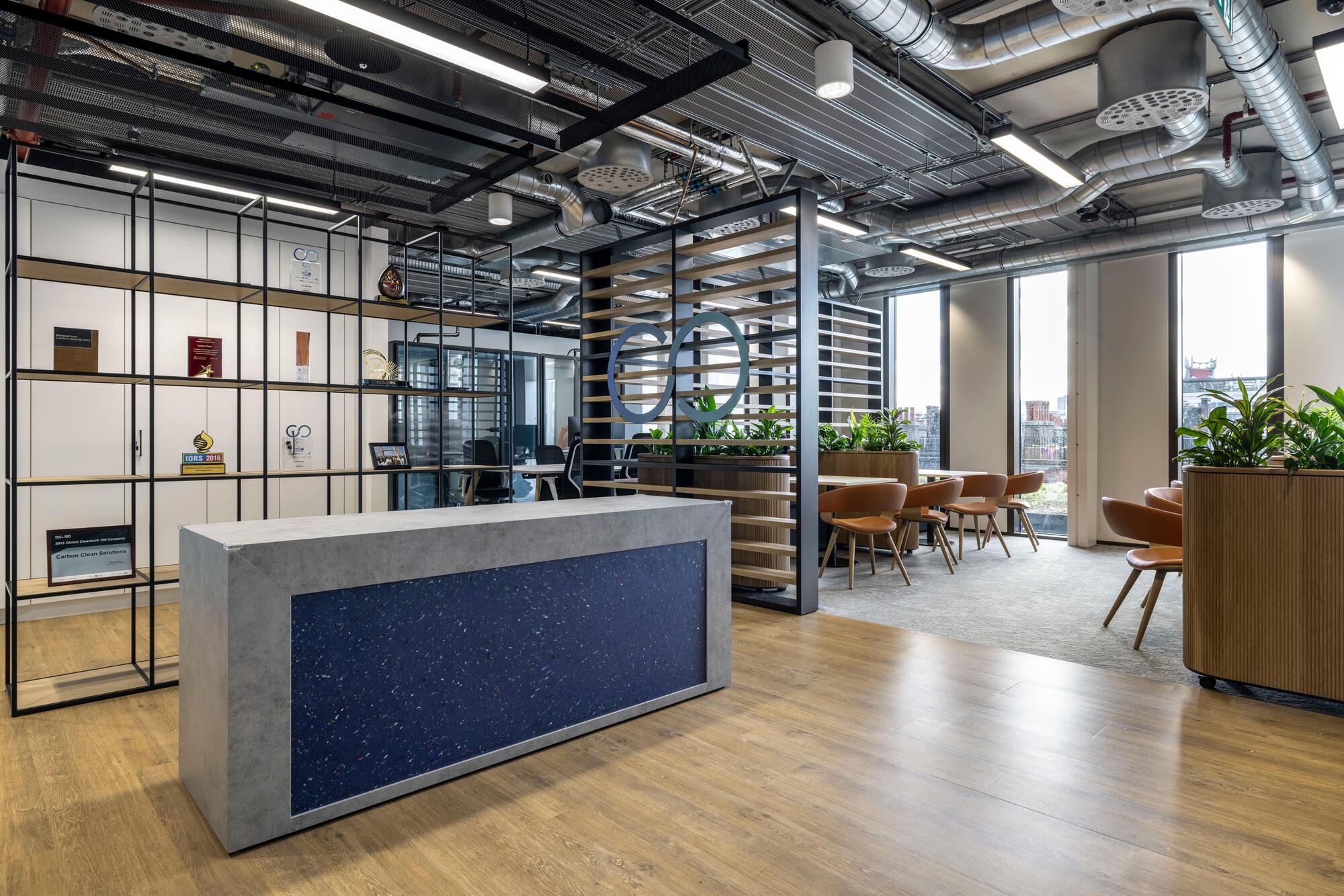 Reception and lounge area at Carbon Clean, with contemporary furniture supplied by Platfform, including soft seating and integrated planters.