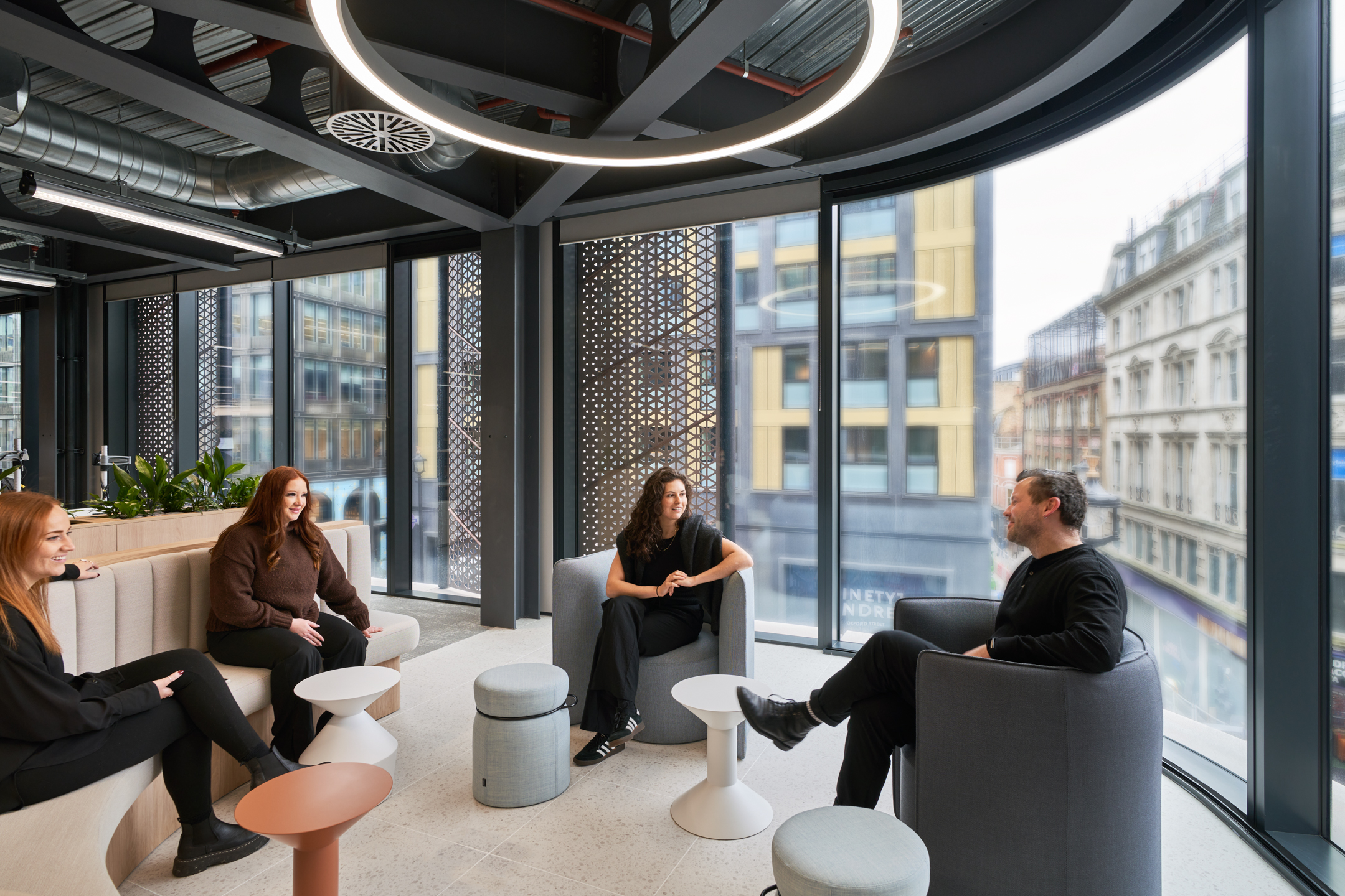 Social breakout area in a Financial Service workspace, with playful soft seating and low tables curated by Platfform to support casual collaboration.