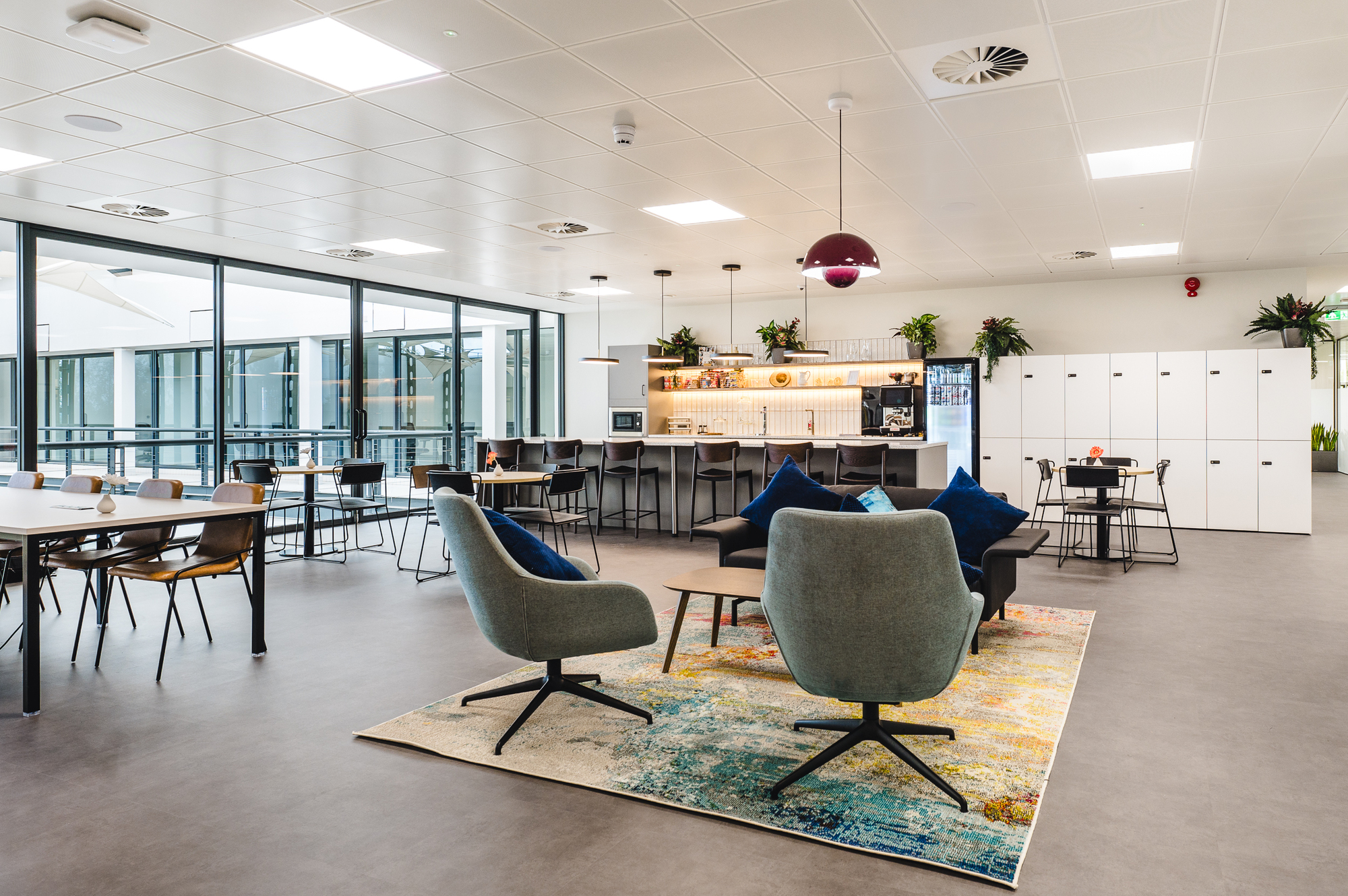 Serendipity Labs Bristol lounge area, combining vibrant seating with open workspace and teapoint facilities.