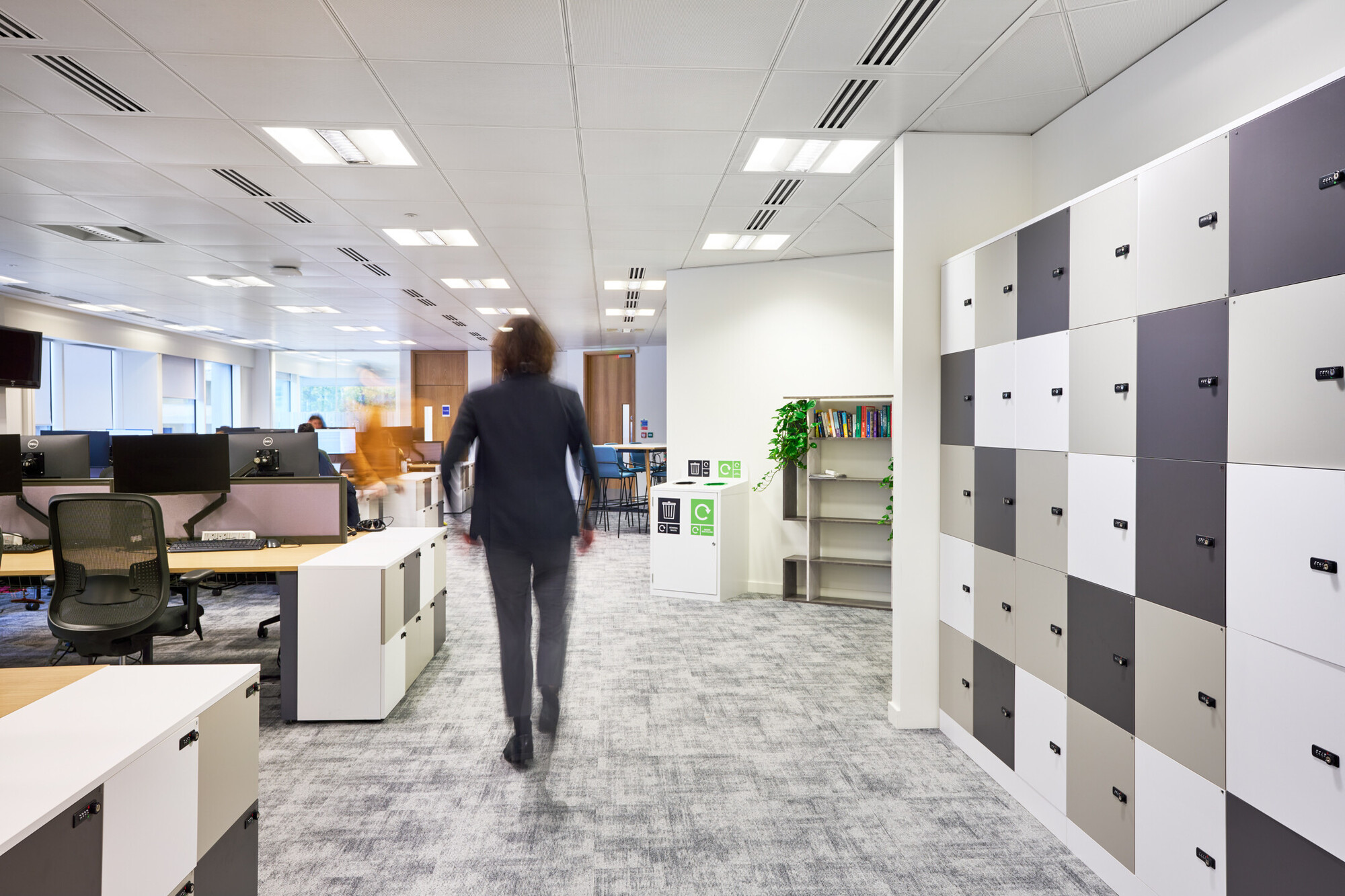 Modern Tech UK workspace with furniture by Platfform, including an open office layout with stylish lockers and an active work environment.