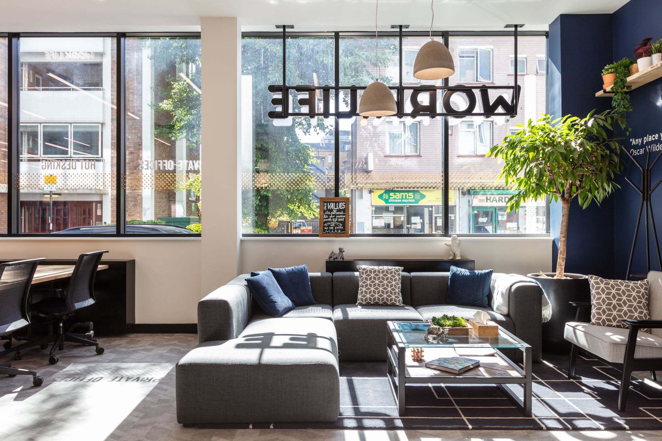A bright lounge area in the Work.life Red Lion Street workspace, with modern sofas, large windows, and a relaxed atmosphere, carefully crafted by Platfform for a perfect work-life balance.