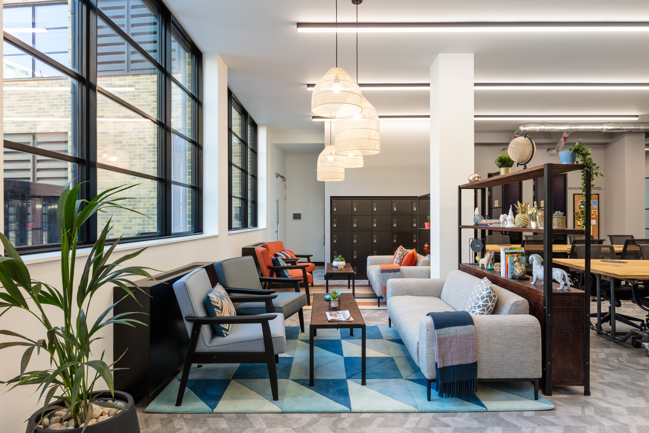 A welcoming communal area at Work.life Red Lion Street, combining natural light, stylish furniture, and a homely vibe, showcasing Platfform's expertise in workspace design.