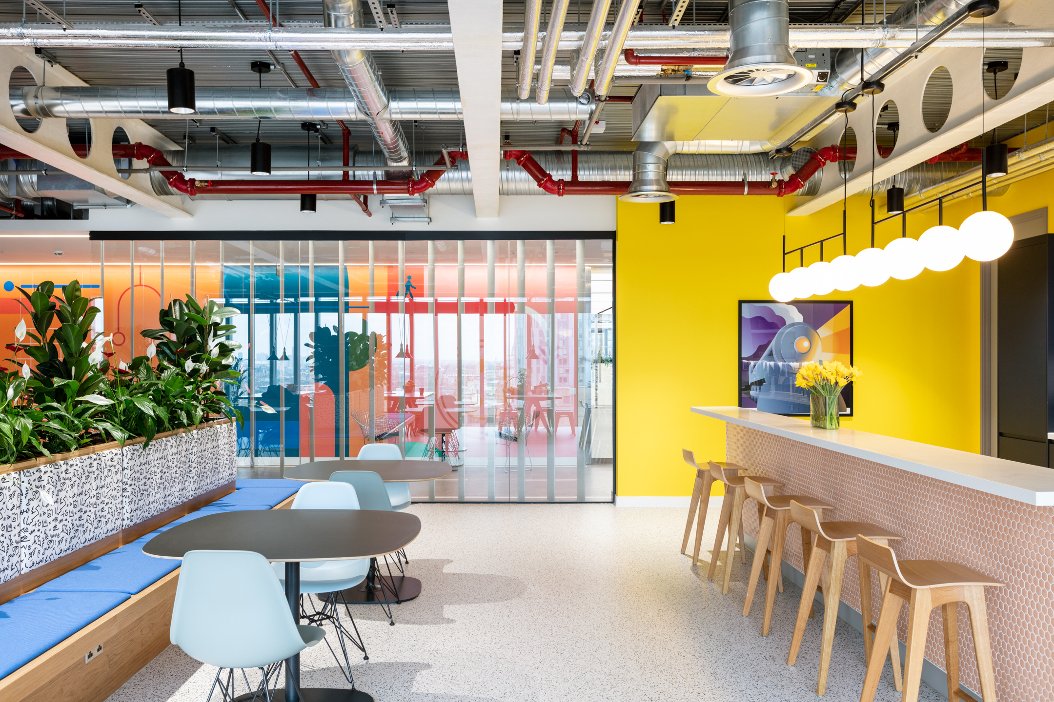 Travelfusion social hub furnished by Platfform, combining soft seating, café tables and bar stools to support casual collaboration and bright breakout moments.
