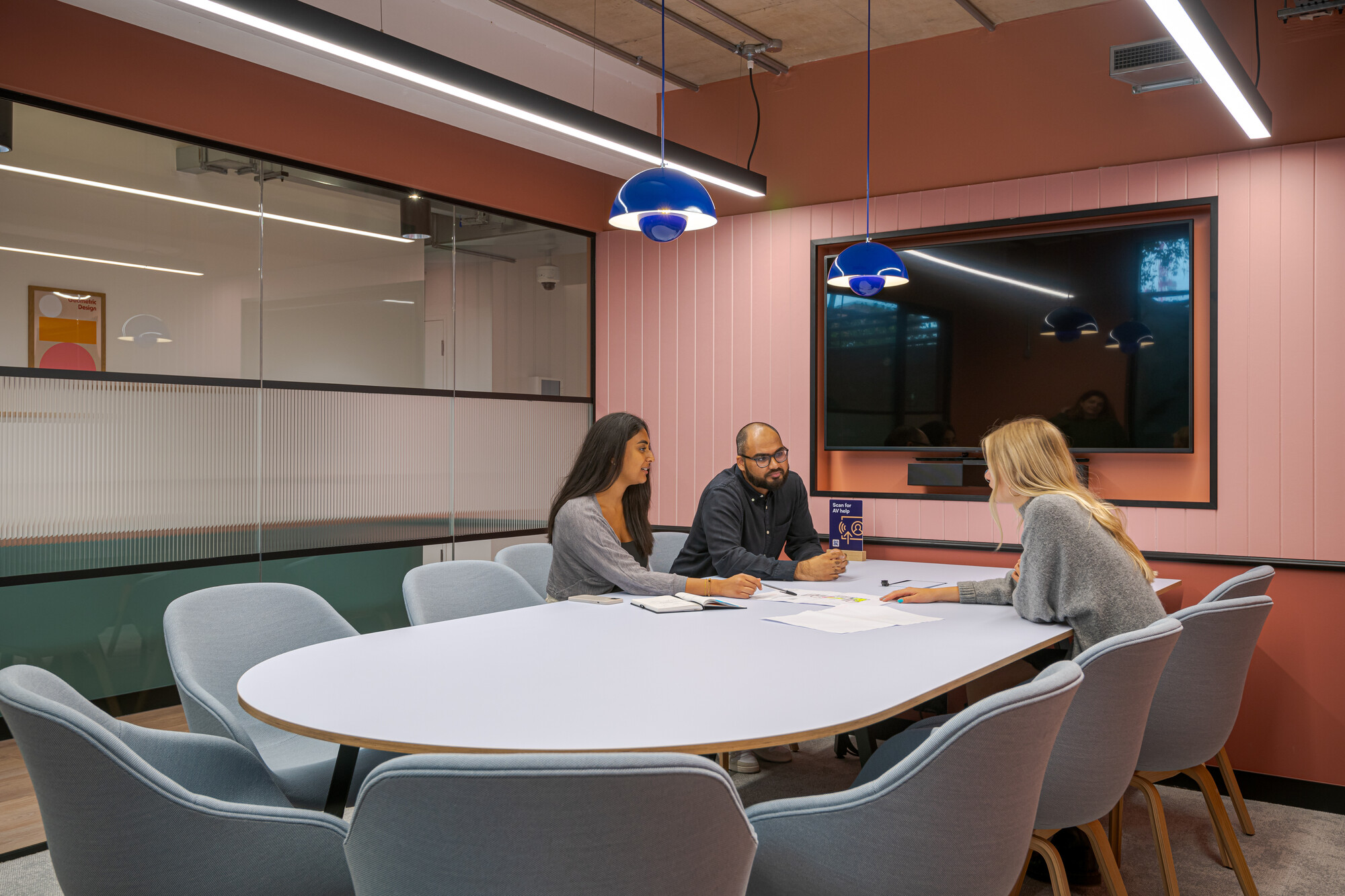 Work.Life Typewriter meeting room with soft blue seating and pink panelling, designed for collaboration in a contemporary Clerkenwell setting.