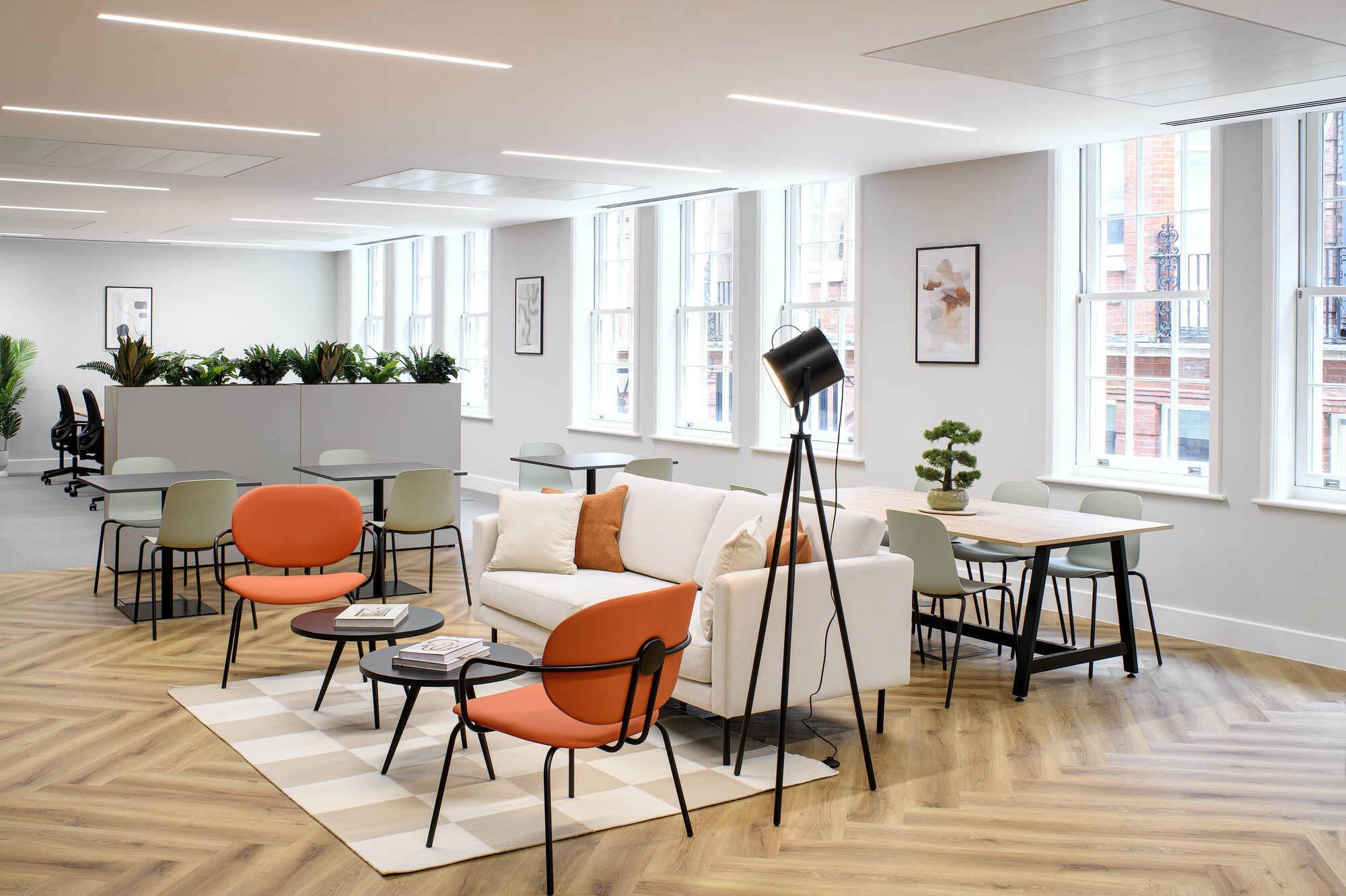 Breakout area furniture for an Asset Management Firm’s Tenant-Ready™ workspace, featuring soft seating, café tables, and a mix of collaborative and relaxed zones.