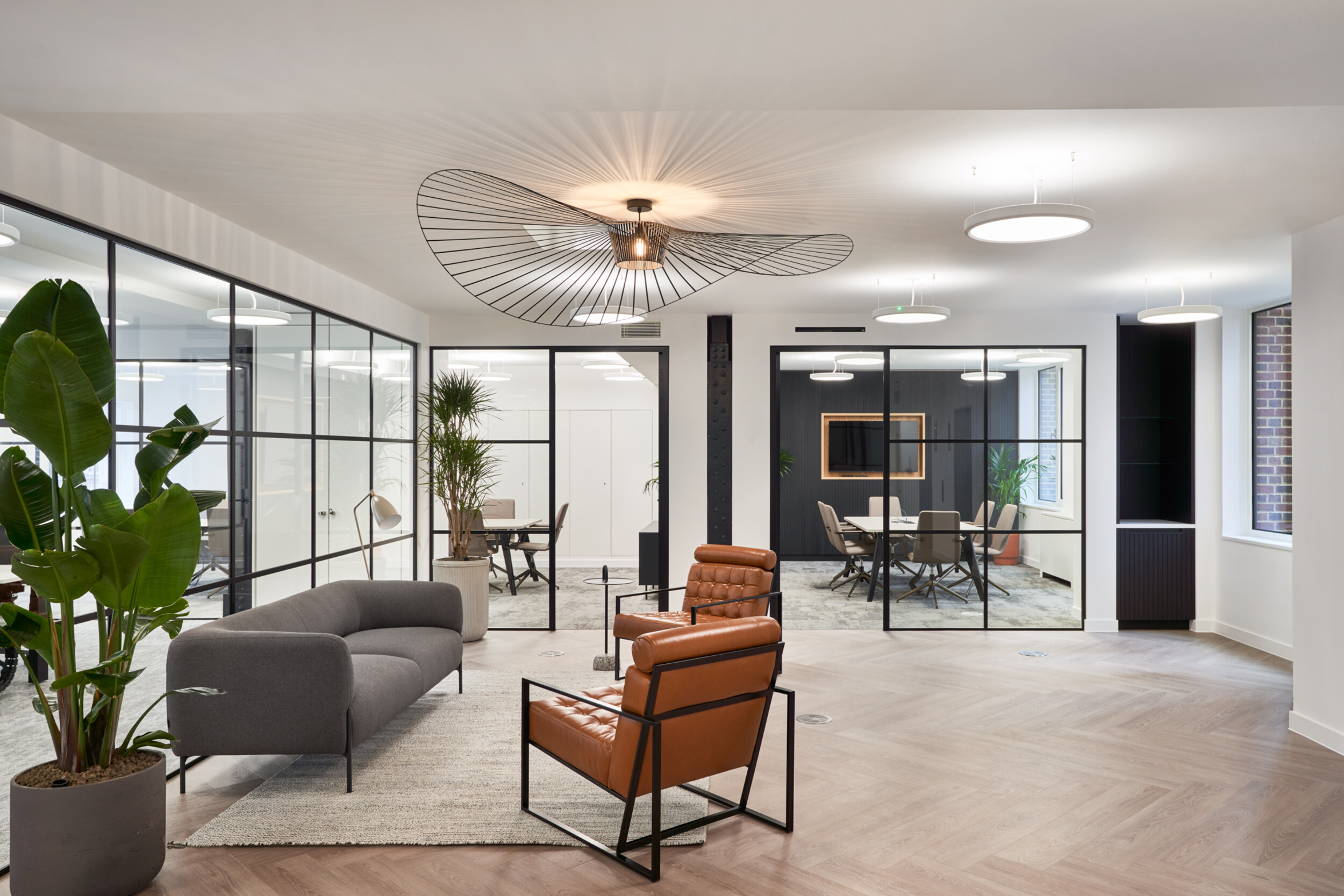 Breakout area at 3 St Helens Place for The Leathersellers, with furniture by Platfform, combining soft seating and low tables to support informal meetings and agile use.