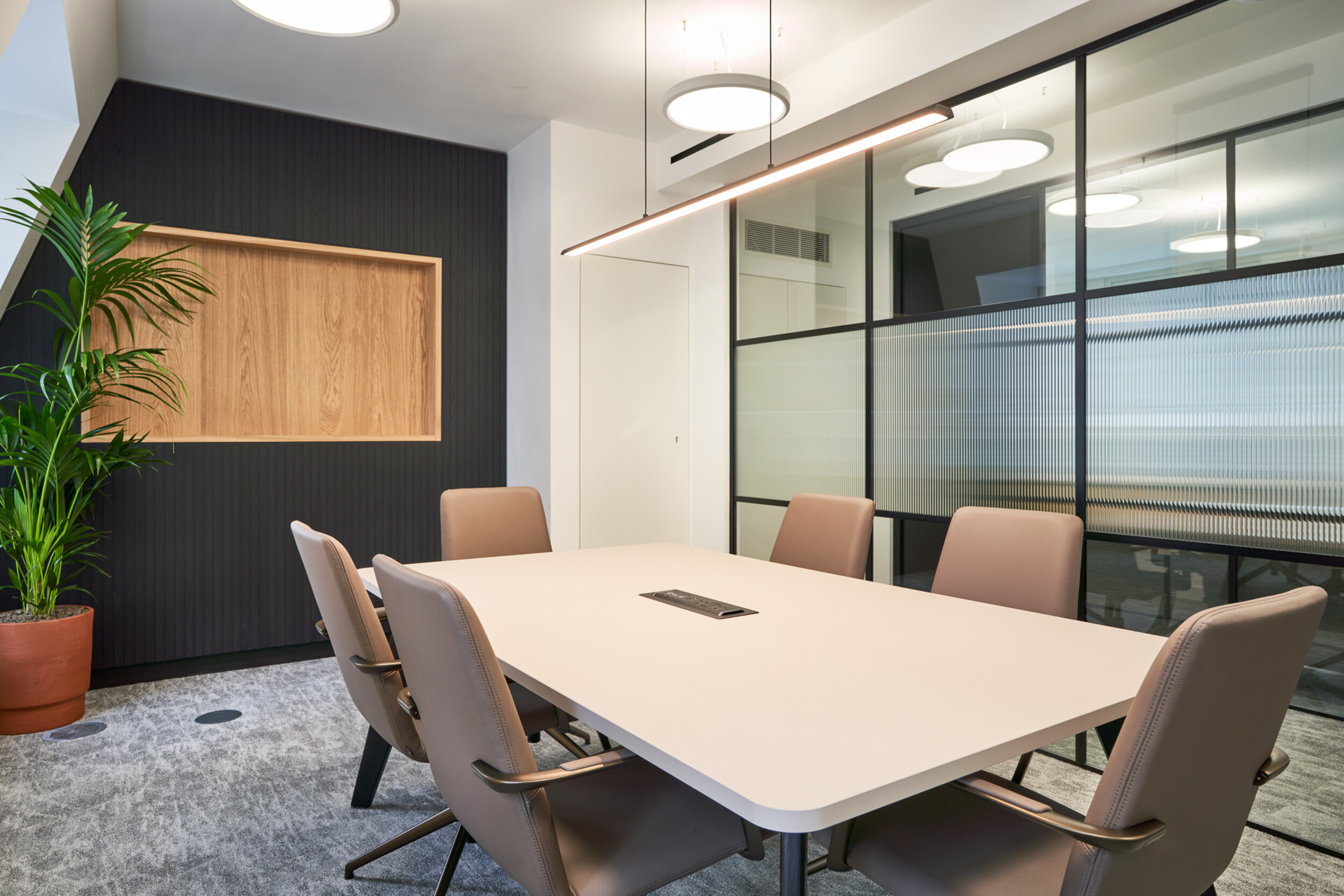 Meeting room at 3 St Helens Place for The Leathersellers, furnished by Platfform, featuring integrated glazing, task seating, and a central table designed for formal collaboration.