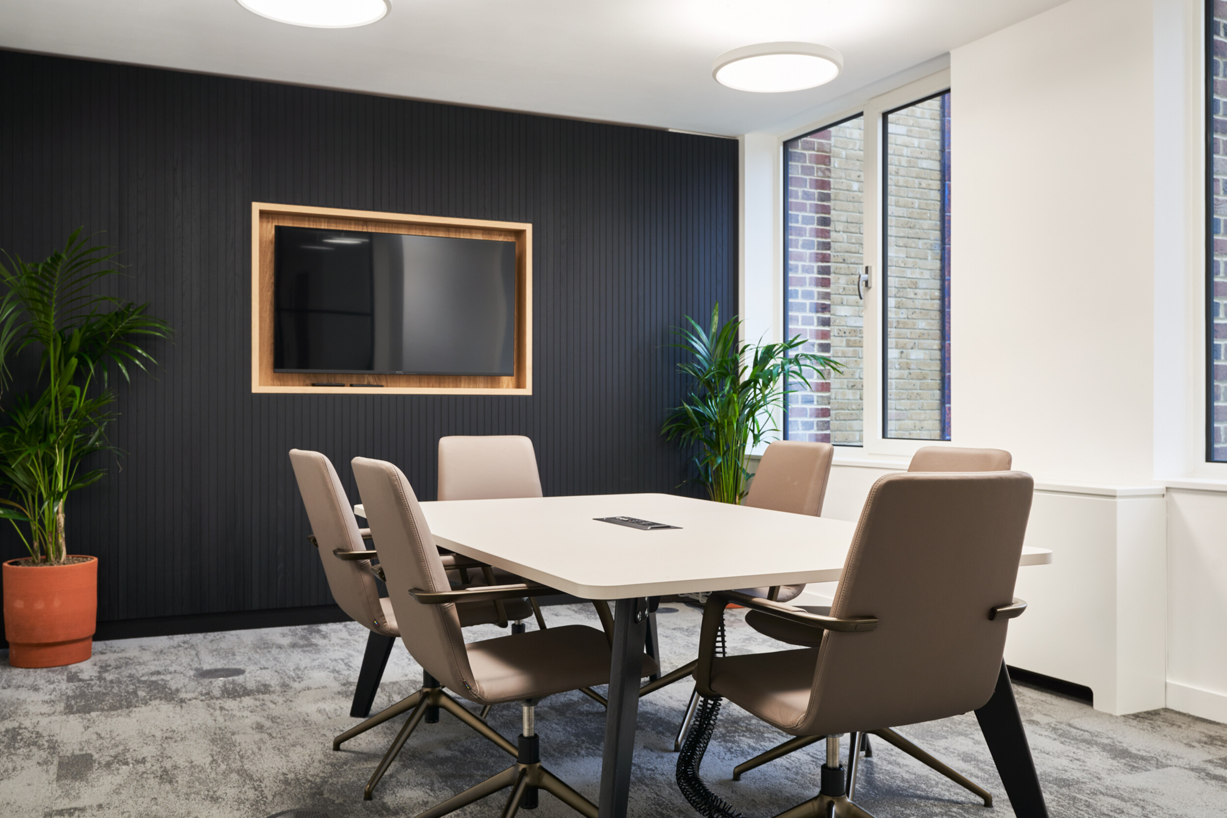 Meeting room at 3 St Helens Place for The Leathersellers, furnished by Platfform, featuring integrated glazing, task seating, and a central table designed for formal collaboration.
