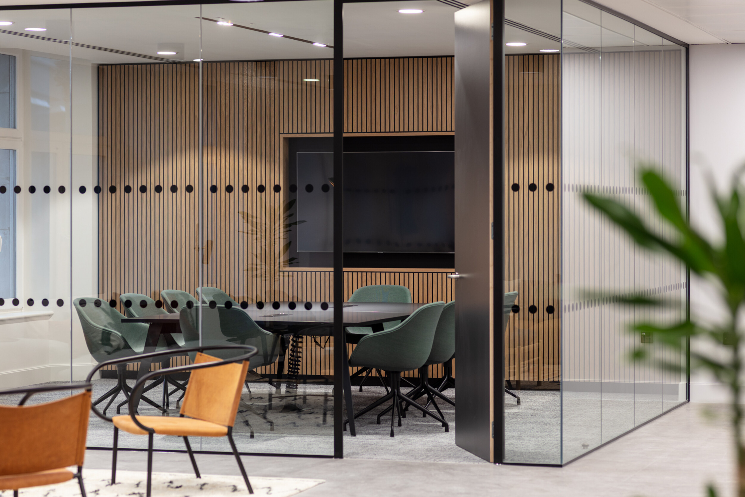 Meeting room at 7 Bishopsgate Level 3, furnished by Platfform, with a central table, integrated AV, and full-height glazing to support high-specification meetings.
