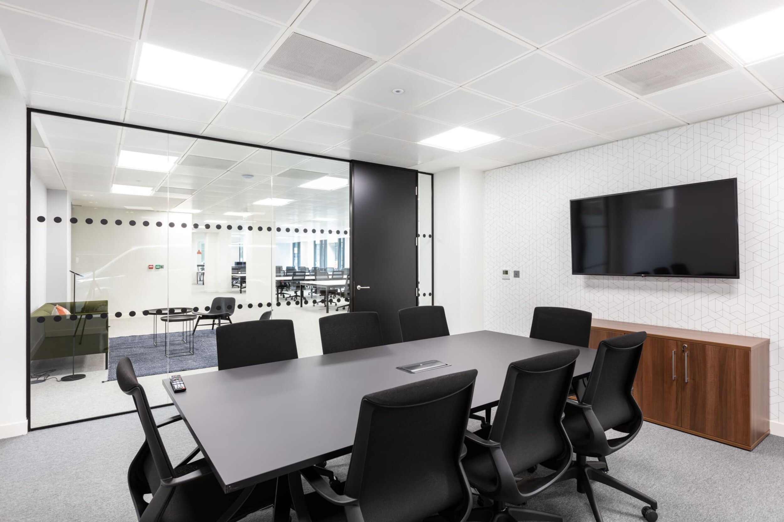 Open office space at Platfform’s Bury House project featuring desks, teapoint areas, glazed meeting rooms, and a variety of collaboration zones.
