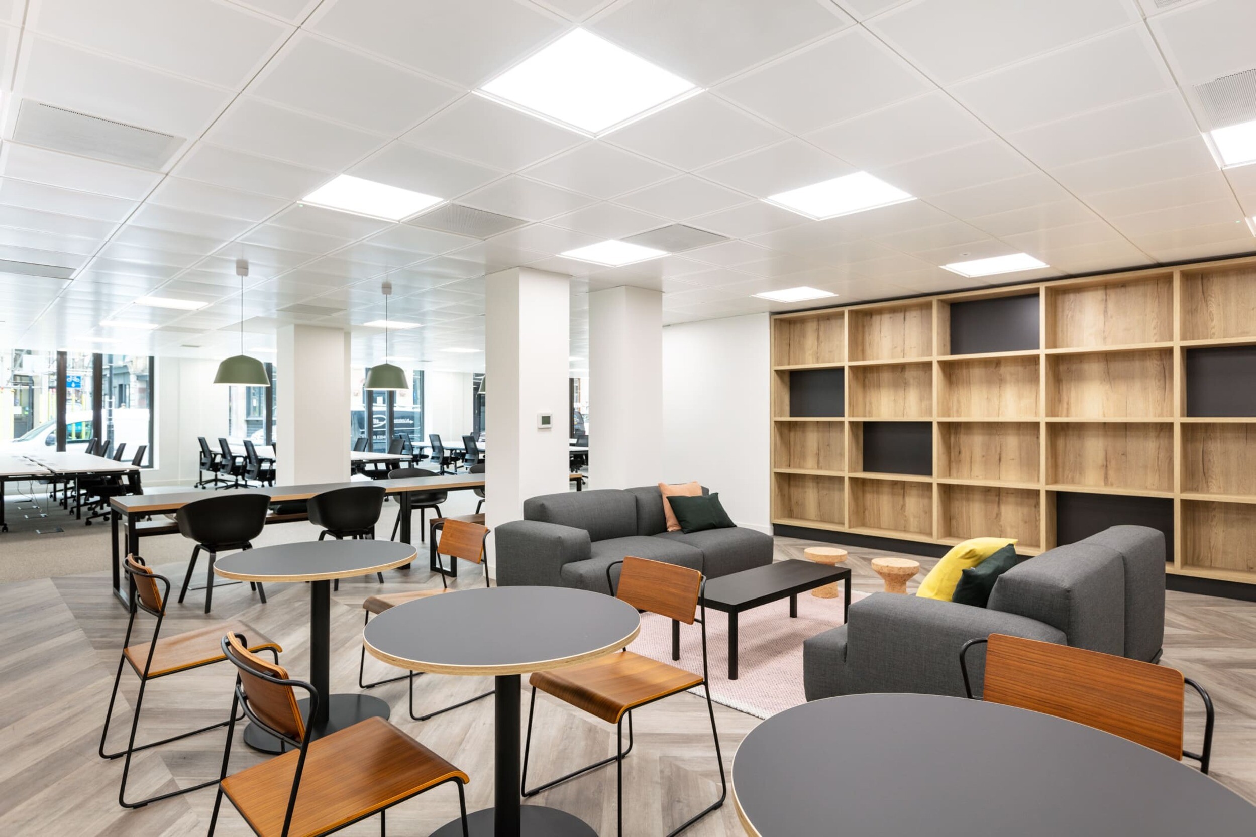 Open office space at Platfform’s Bury House project featuring desks, teapoint areas, glazed meeting rooms, and a variety of collaboration zones.