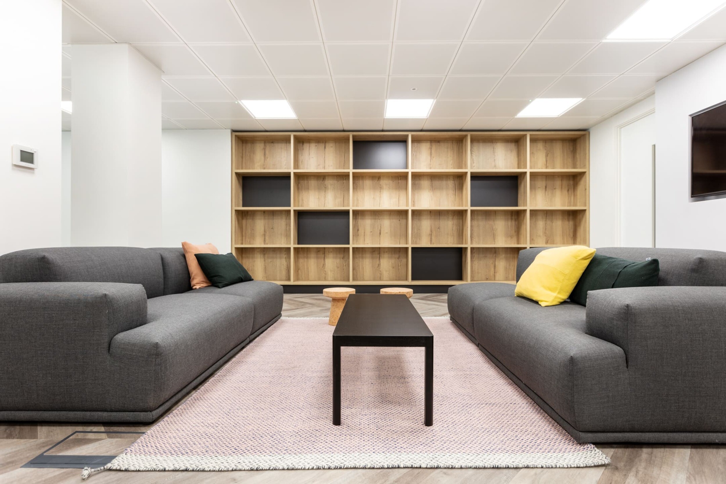 Open office space at Platfform’s Bury House project featuring desks, teapoint areas, glazed meeting rooms, and a variety of collaboration zones.