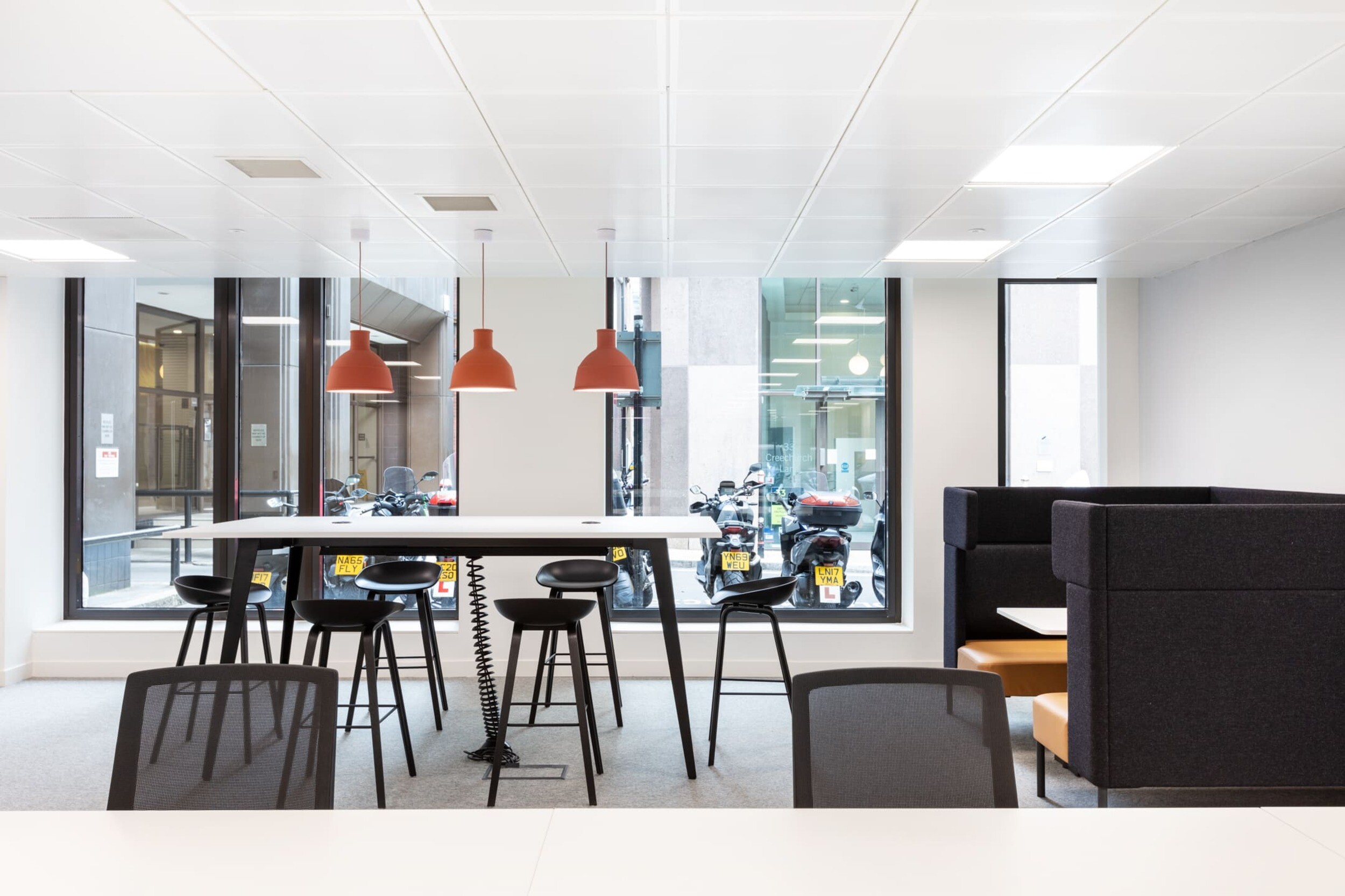 Open office space at Platfform’s Bury House project featuring desks, teapoint areas, glazed meeting rooms, and a variety of collaboration zones.
