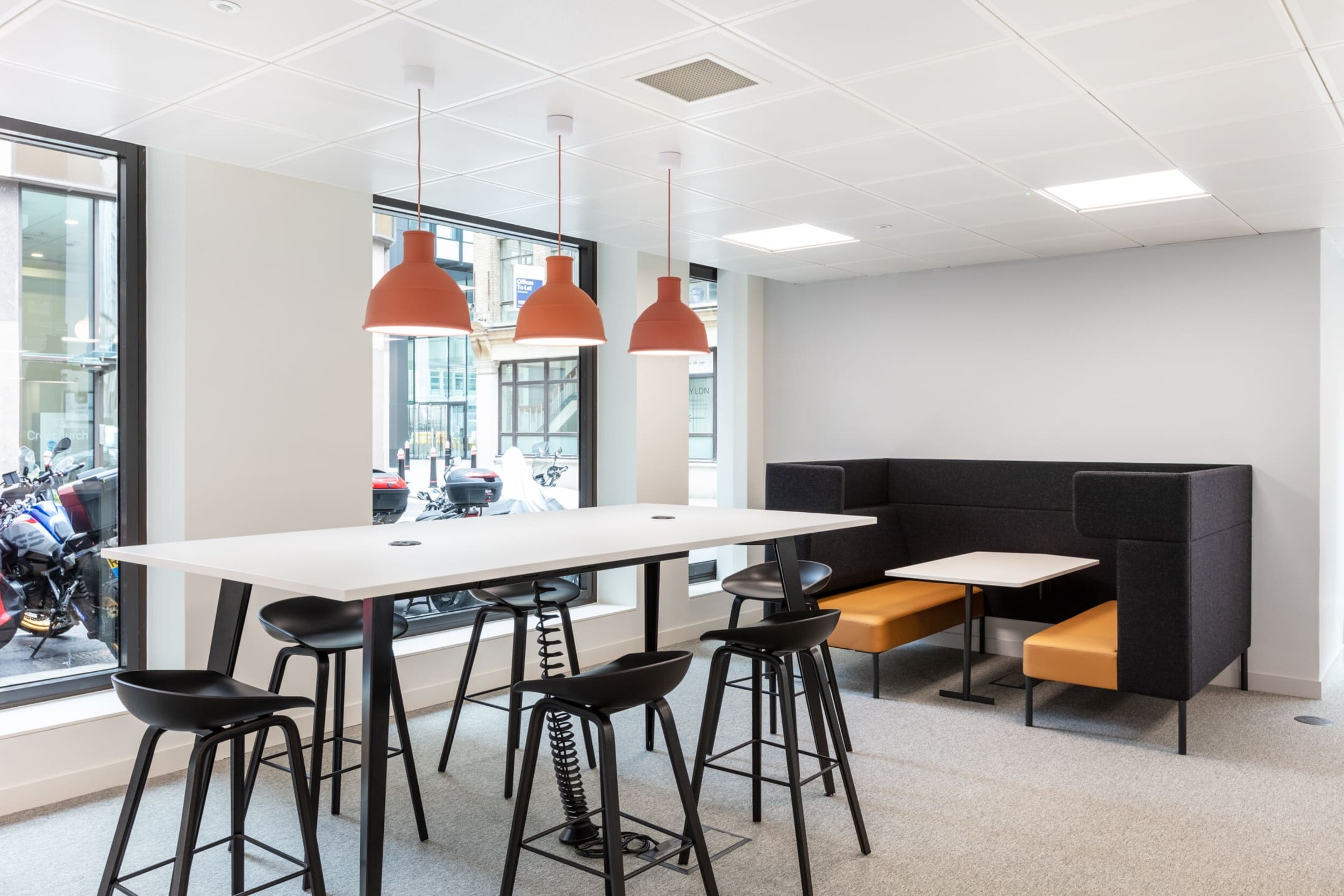Open office space at Platfform’s Bury House project featuring desks, teapoint areas, glazed meeting rooms, and a variety of collaboration zones.